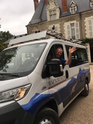 Photo of Rob Williams of the Motherlode Bicycle Coalition in a white and blue van